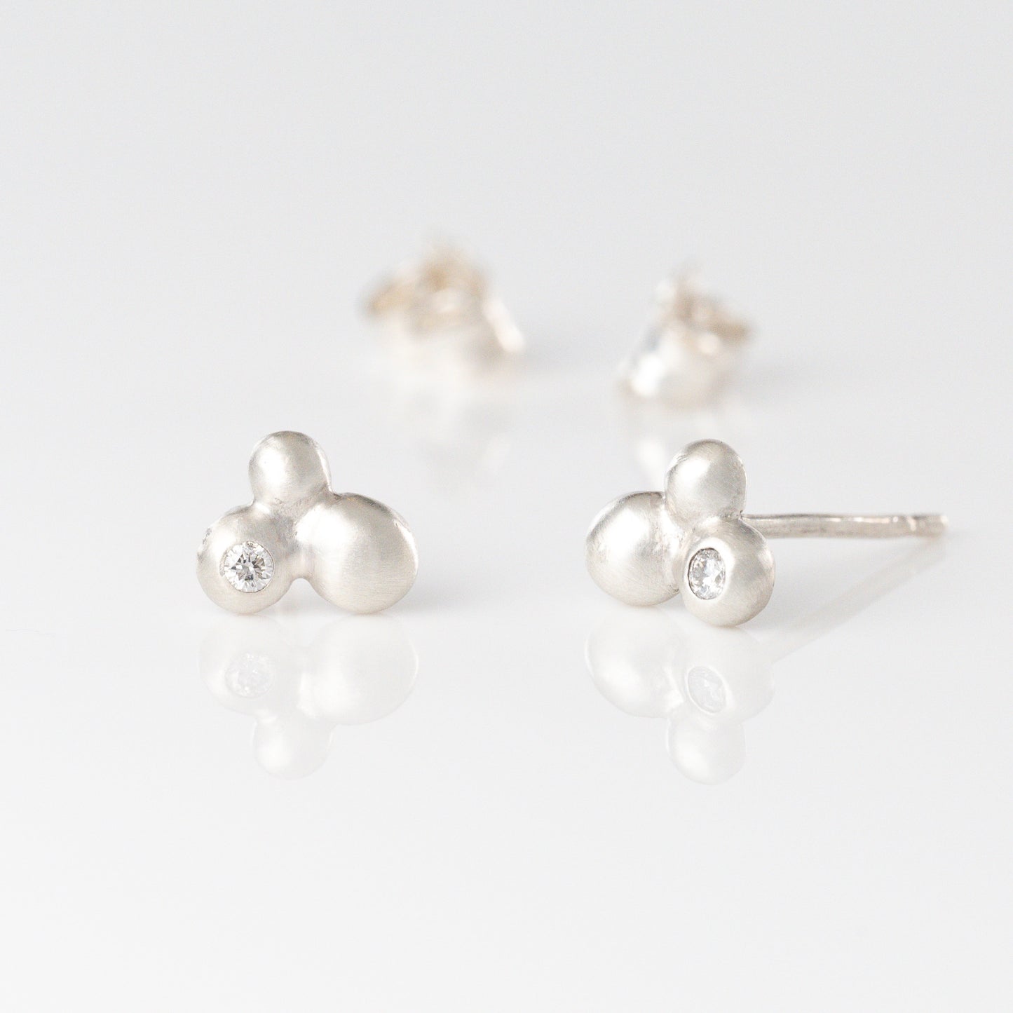 Sterling Silver Pebble Stud Earrings With Diamond Accents