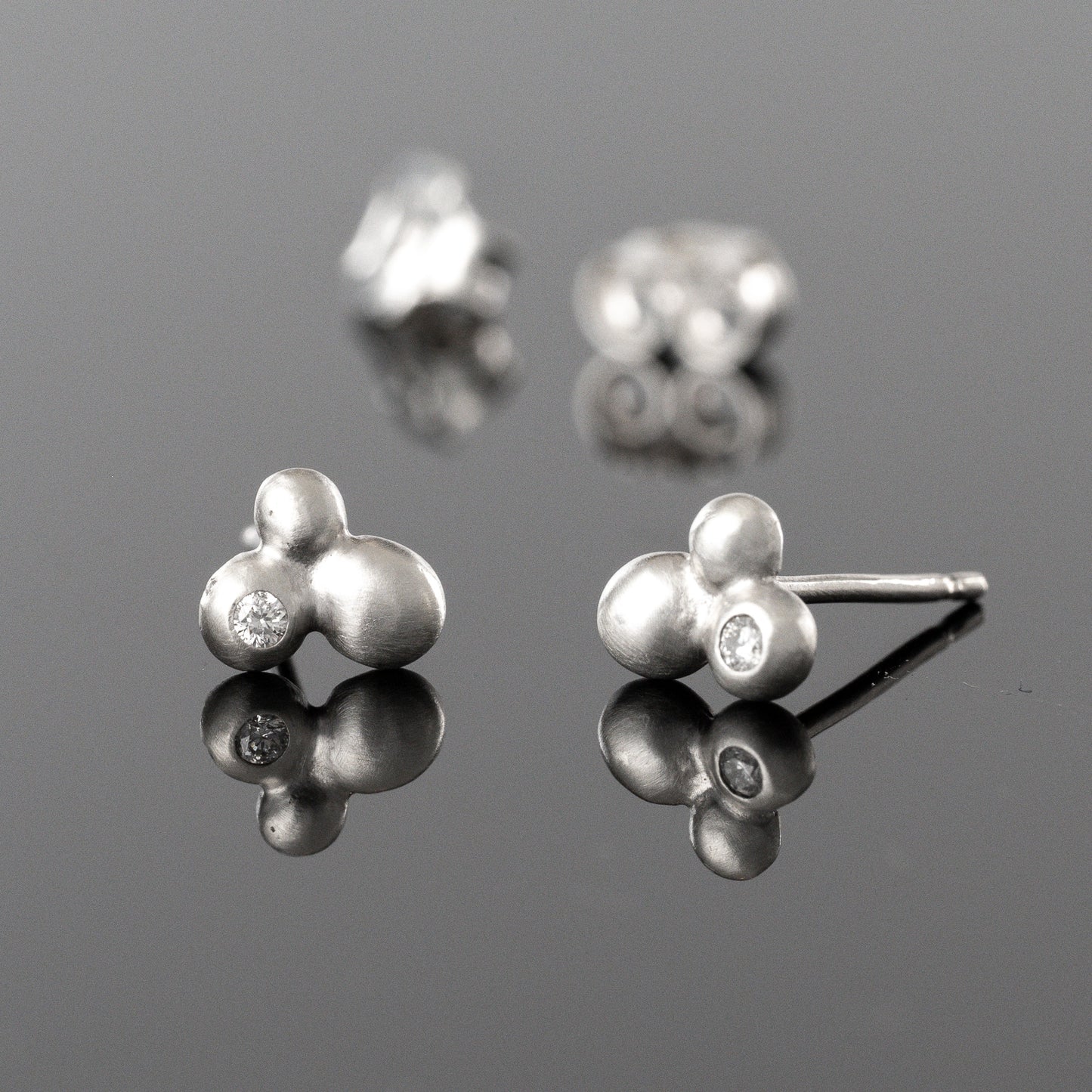Sterling Silver Pebble Stud Earrings With Diamond Accents