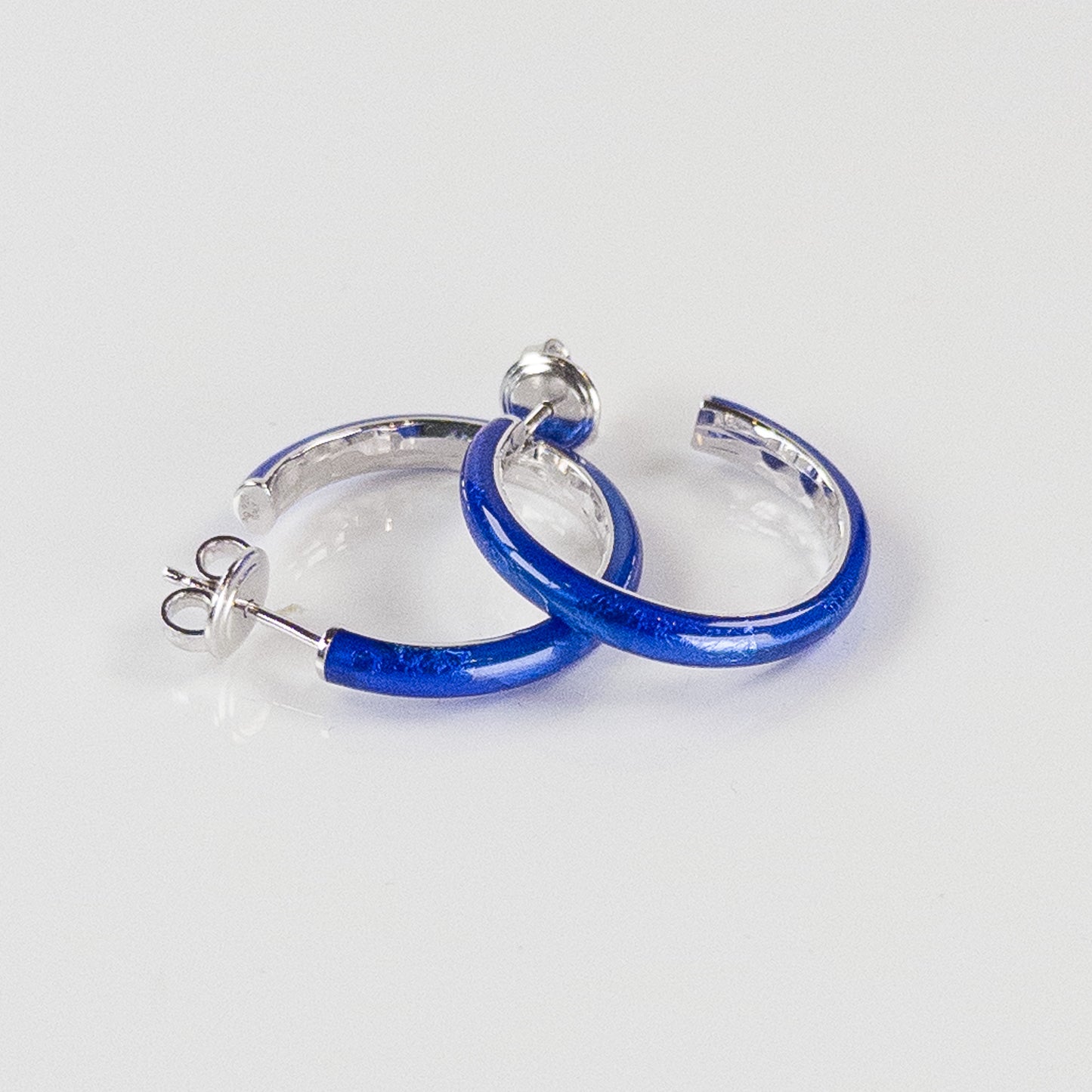 SOHO Sterling Silver and Cobalt Blue Foliage Enamel Post-Style Hoop Earrings with Hammered Detail (Small)